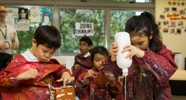 One of the creative extracurricular activities - students team up during cooking class.
